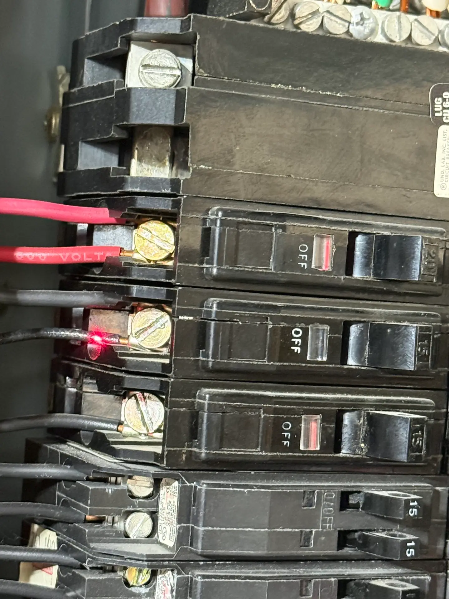 Breaker with two conductors of different gauges connected to same terminal