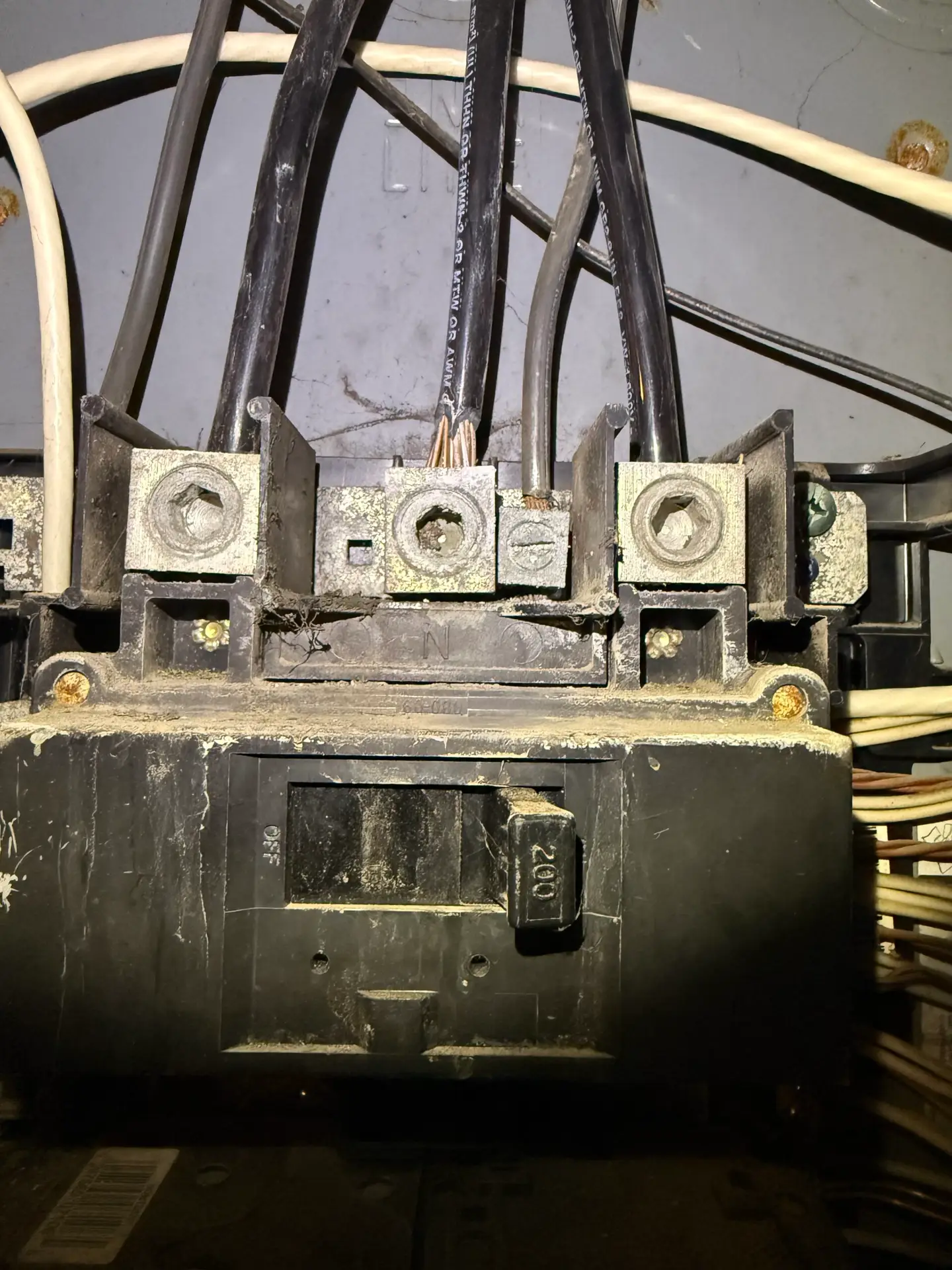 Corrosion visible on components inside electrical panel