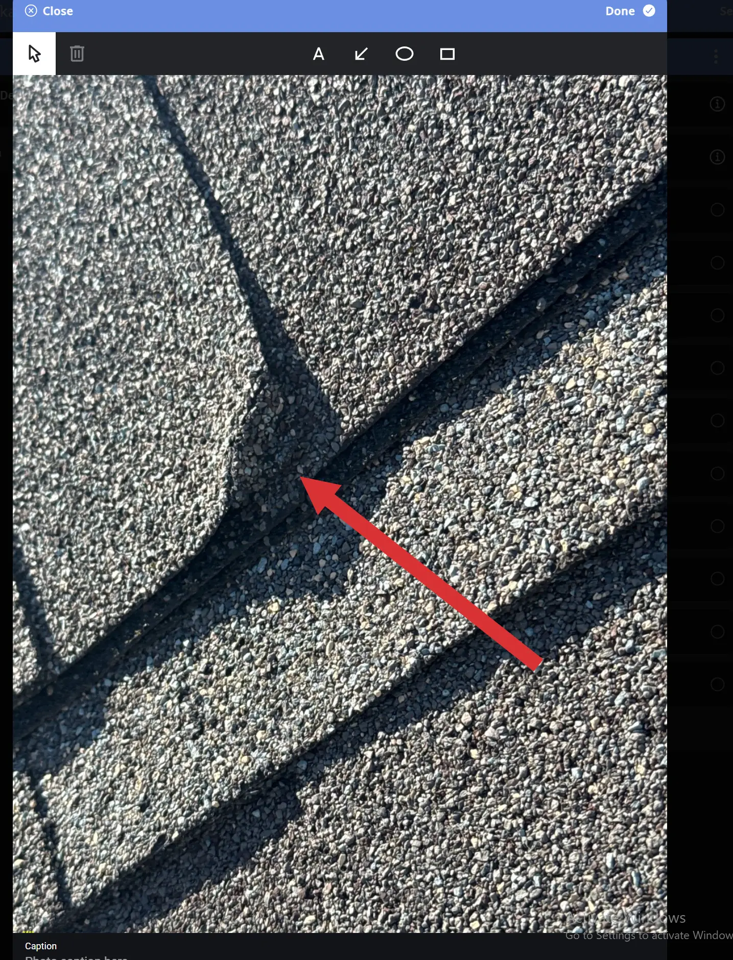 Roof shingle with bent corner at lower edge