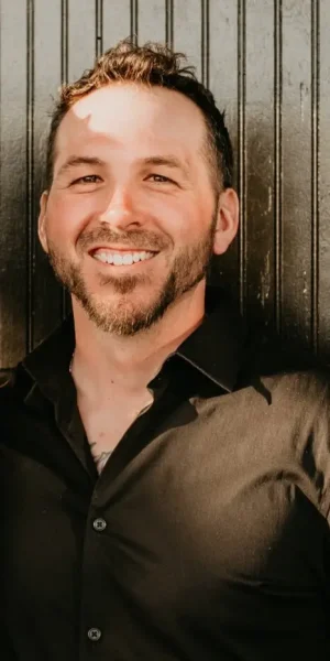 “Home inspector Alex standing for a professional portrait.